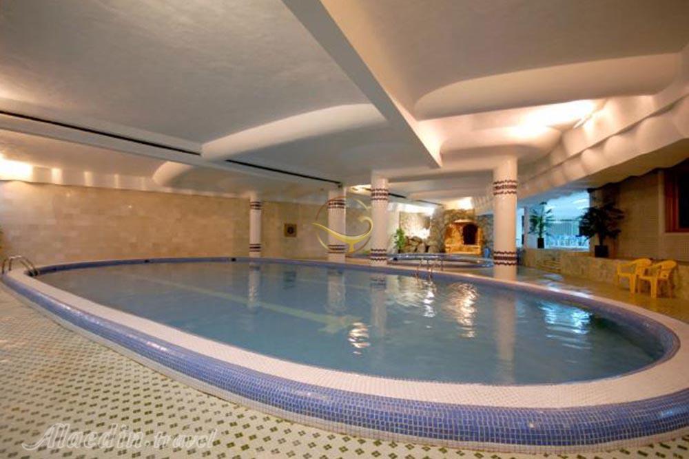 Swimming pool of four star Eram Grand Hotel in Kish| Alaedin Travel