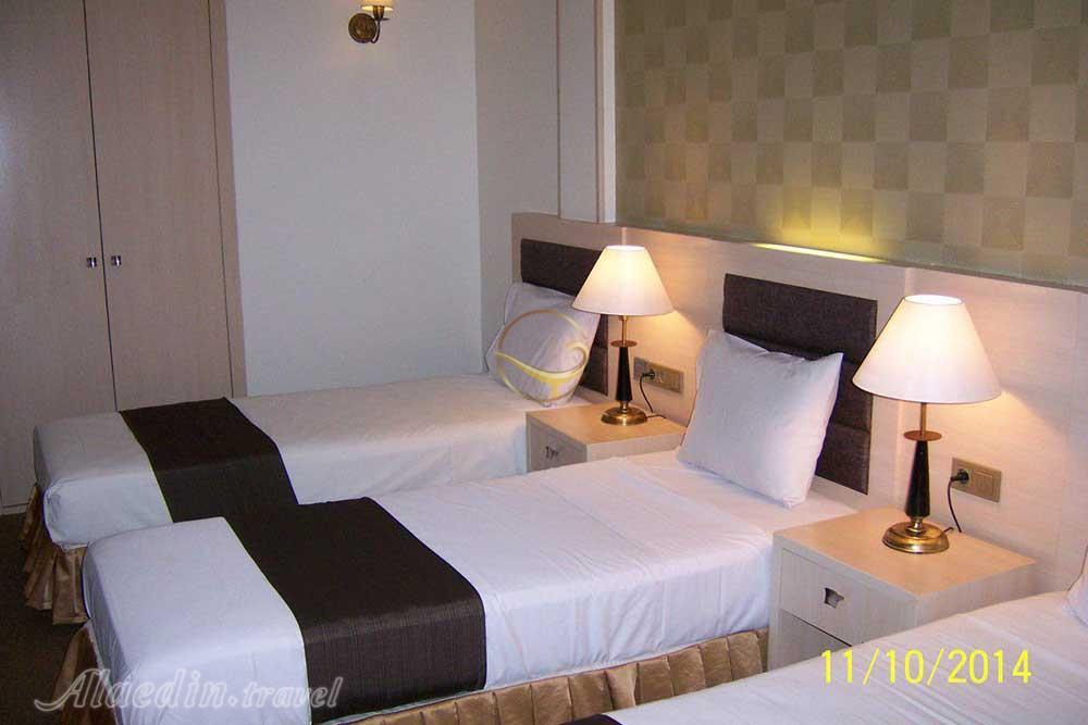 Triple room of three star Atlas Hotel in Mashhad| Alaedin Travel