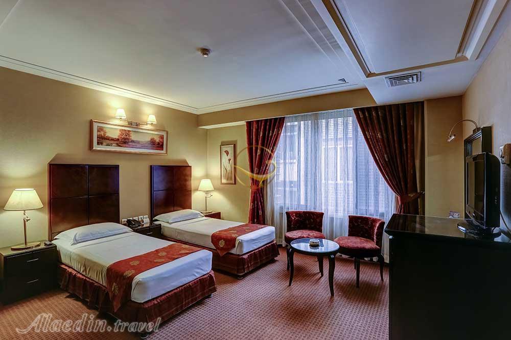 Twin room of four star Javad Hotel in Mashhad| Alaedin Travel