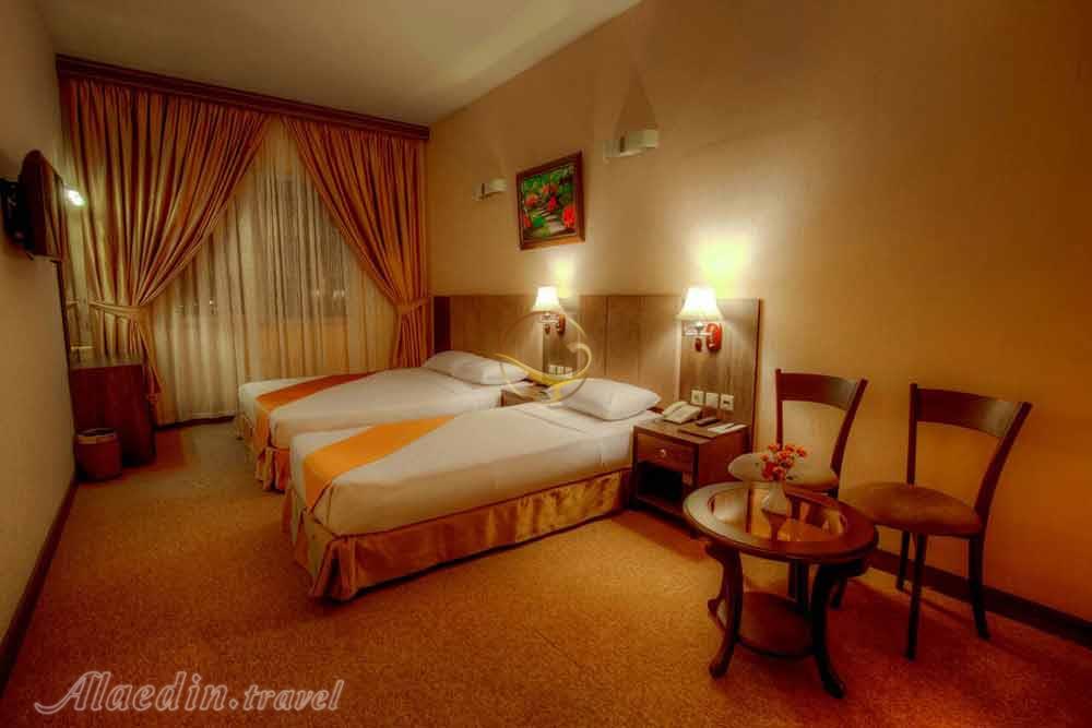 Triple room of four star Kiana Hotel in Mashhad| Alaedin Travel