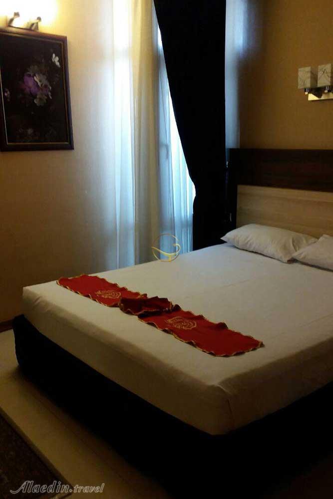 Double room of three star Monji Hotel in Mashhad| Alaedin Travel