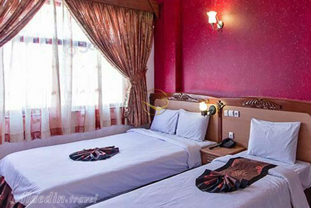 Twin room of three star Parmida Hotel in Mashhad| Alaedin Travel