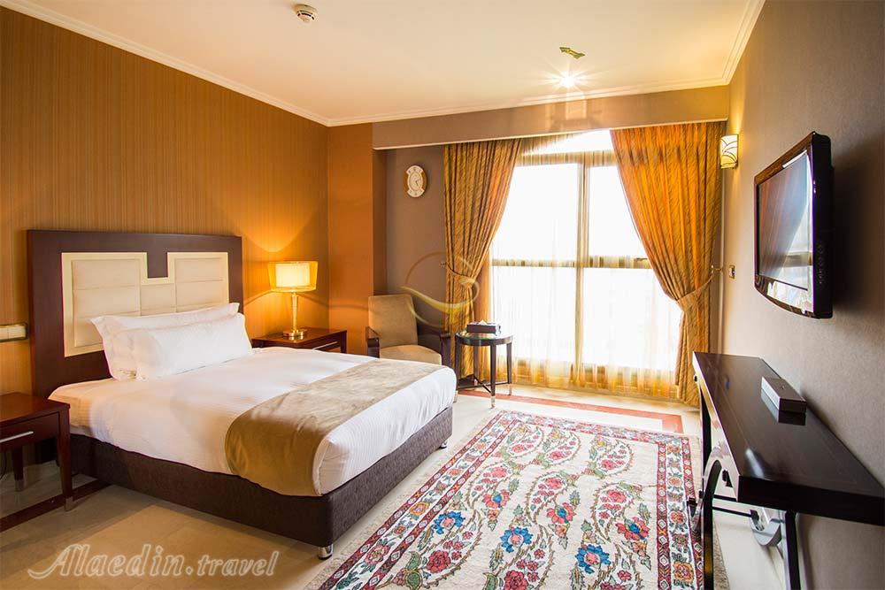 Single room of five star Espinas Hotel in Tehran| Alaedin Travel